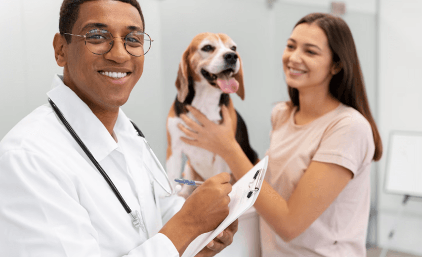 Student and veterinarian with a dog